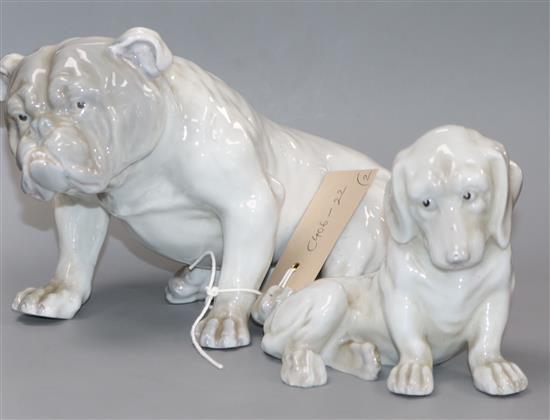 Two Heubach Gebruder figures of a bulldog and a dachshund